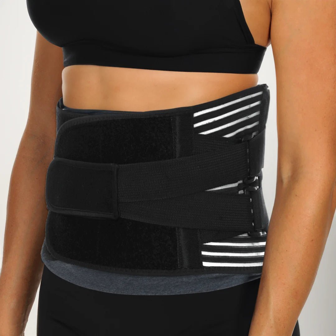 Woman wearing the Lower Back Brace Support Belt for posture correction and lower back pain relief. This back support belt offers adjustable compression, making it the best back brace for lower back pain and everyday use.