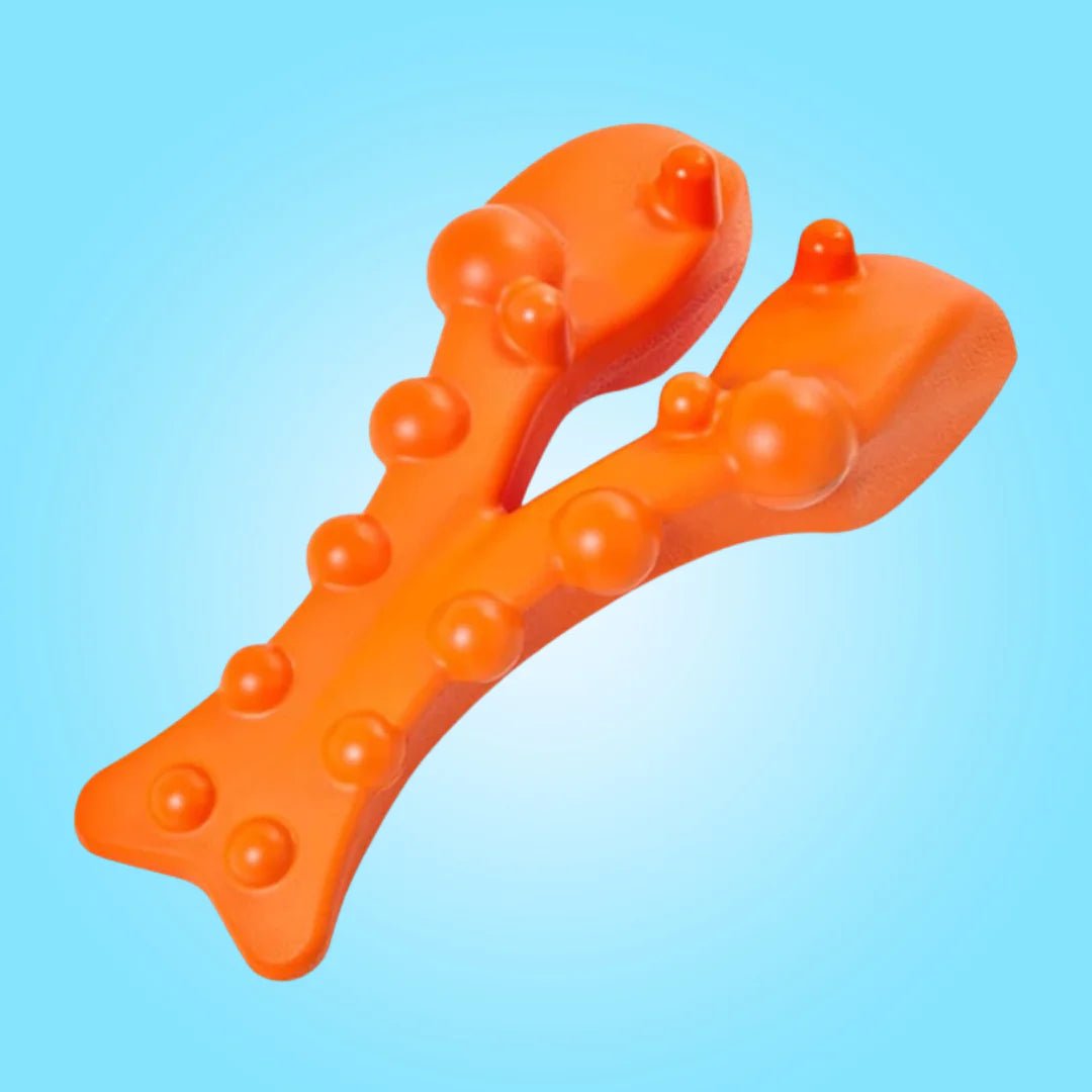 Orange trigger point massager with raised nodes for deep tissue therapy and pressure point relief, designed to alleviate pain and reduce muscle tension.