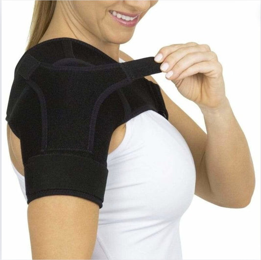 Woman adjusting a shoulder brace, designed for compression, shoulder pain relief, and support. Best shoulder compression sleeve for injury recovery, posture correction, and shoulder support.